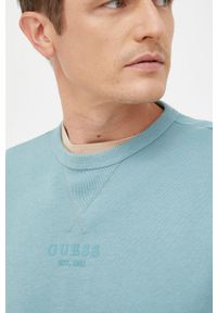 Guess bluza męska kolor turkusowy z aplikacją. Kolor: turkusowy. Materiał: bawełna. Wzór: aplikacja