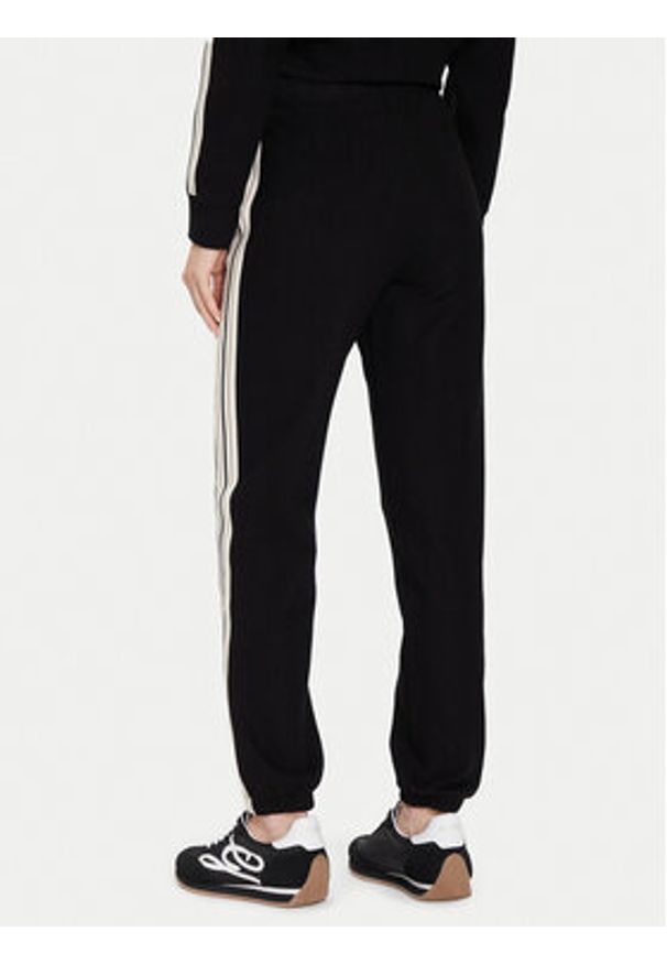 Guess Spodnie dresowe V5BB17 KCX52 Czarny Regular Fit. Kolor: czarny. Materiał: syntetyk