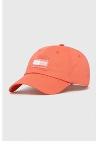 Tommy Jeans czapka z daszkiem bawełniana kolor pomarańczowy wzorzysta. Kolor: pomarańczowy. Materiał: bawełna #1
