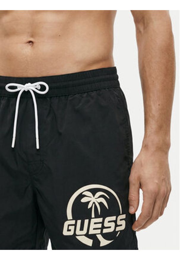 Guess Szorty kąpielowe F6GT01 WN162 Czarny Regular Fit. Kolor: czarny. Materiał: syntetyk