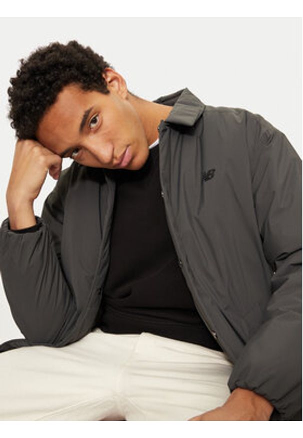 New Balance Kurtka przejściowa MJ43504 Beżowy Regular Fit. Kolor: beżowy. Materiał: syntetyk