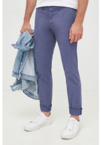 TOMMY HILFIGER - Tommy Hilfiger spodnie męskie w fasonie chinos. Kolor: niebieski. Materiał: bawełna