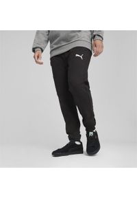 Spodnie dresowe Puma TeamFinal. Kolor: czarny. Materiał: dresówka. Sport: piłka nożna, bieganie #1