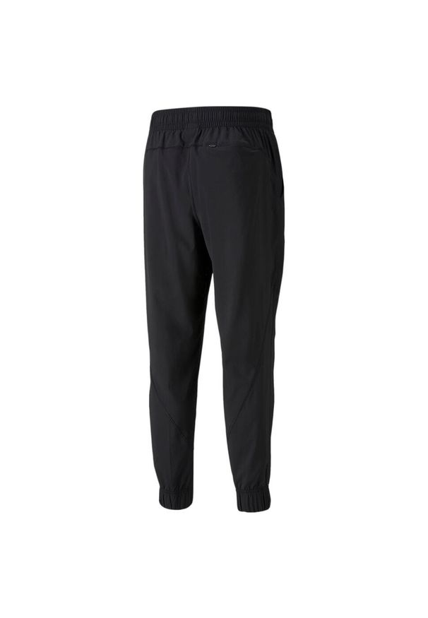Spodnie Dresowe Sportowe Męskie Puma Train Vent Woven. Kolor: czarny. Materiał: dresówka