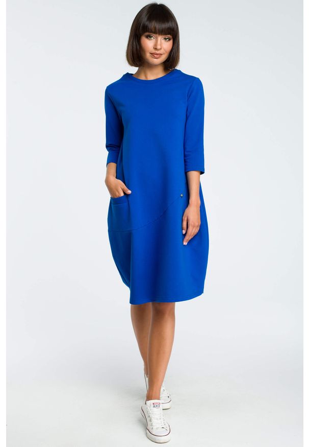Sukienki.shop - Sukienka dresowa bombka oversize z kieszonką z przodu niebieska. Okazja: na co dzień. Kolor: niebieski, szary. Materiał: dresówka. Typ sukienki: bombki, oversize. Styl: elegancki, casual
