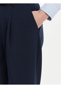 TOMMY HILFIGER - Tommy Hilfiger Chinosy WW0WW44793 Granatowy Tapered Fit. Kolor: niebieski. Materiał: syntetyk #4