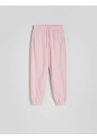 Reserved - Spodnie dresowe z efektem acid wash - pastelowy róż. Kolor: różowy. Materiał: dresówka #1