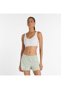 Biustonosz New Balance WB51052GYM – biały. Kolor: biały. Materiał: skóra, poliester, lycra, materiał, tkanina. Wzór: gładki. Sport: fitness #1