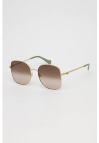 Gucci okulary przeciwsłoneczne damskie kolor złoty. Kolor: złoty. Wzór: geometria #5