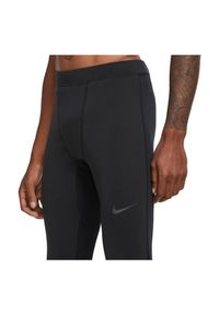 Legginsy męskie do biegania Nike Thermal CU6079. Materiał: materiał, poliester, tkanina. Technologia: Dri-Fit (Nike). Sport: bieganie #4