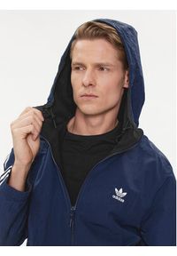 Adidas - adidas Kurtka przejściowa Reversible Polar Fleece HL9188 Granatowy Regular Fit. Kolor: niebieski. Materiał: syntetyk
