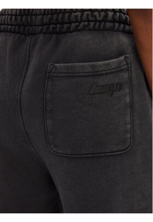 Hugo - HUGO Spodnie dresowe Nolasa_B 50545019 Czarny Loose Fit. Kolor: czarny. Materiał: bawełna