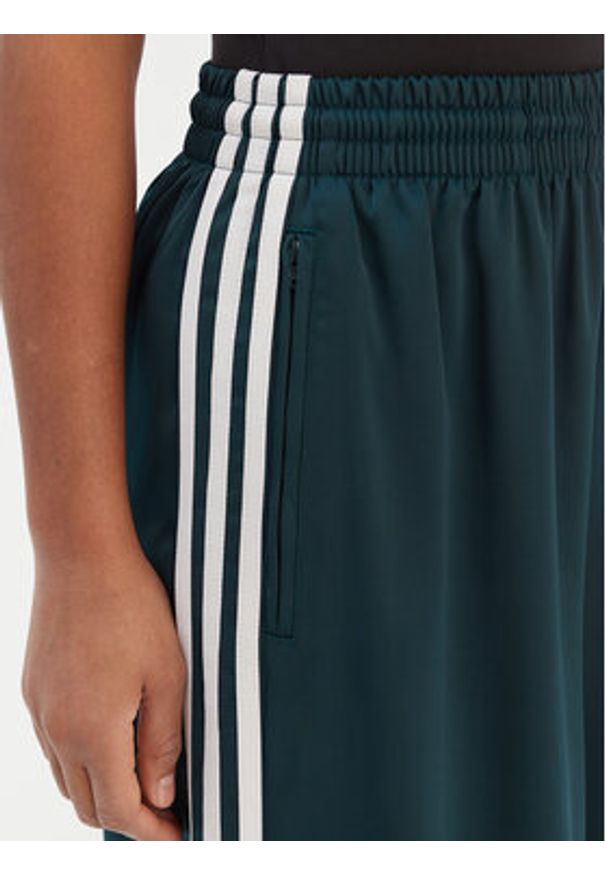 Adidas - adidas Spodnie dresowe adicolor Satin JV7511 Zielony Wide Leg. Kolor: zielony. Materiał: syntetyk