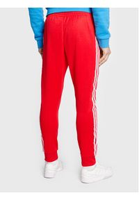 Adidas - adidas Spodnie dresowe adicolor Classics Primeblue HF2134 Czerwony Slim Fit. Kolor: czerwony. Materiał: syntetyk, dresówka, bawełna #3