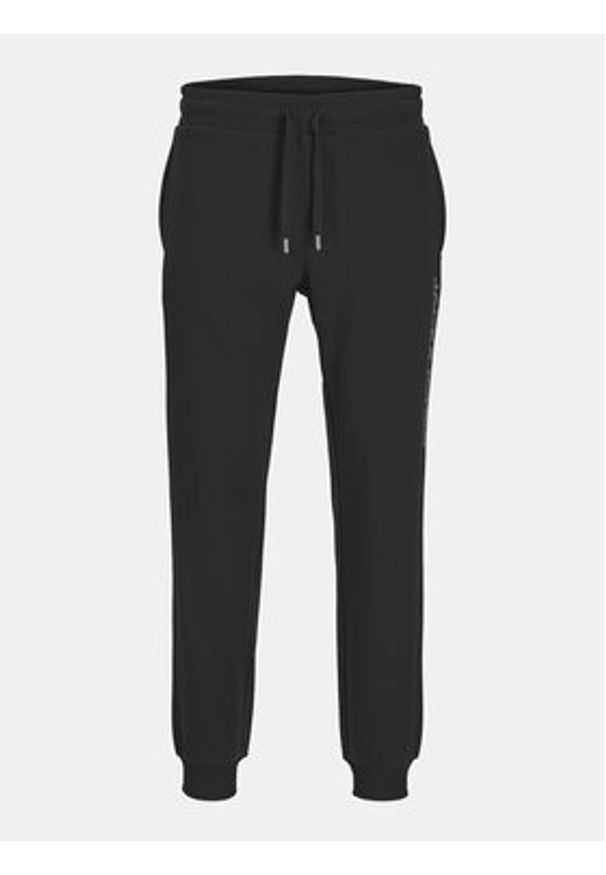 Jack & Jones - Jack&Jones Spodnie dresowe Gordon 12258477 Czarny Regular Fit. Kolor: czarny. Materiał: bawełna, syntetyk