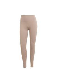 Adidas - Legginsy All Me 7/8. Kolor: brązowy