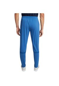 Nike - Spodnie sportowe męskie Dri-FIT Academy Pants. Kolor: niebieski. Materiał: poliester. Technologia: Dri-Fit (Nike)