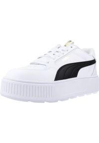 Buty do chodzenia dla dzieci Puma Karmen Rebelle JR. Zapięcie: sznurówki. Kolor: biały. Materiał: syntetyk, materiał. Szerokość cholewki: normalna. Sport: turystyka piesza
