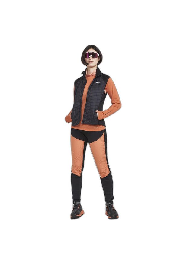 Kurtka uniwersalna damska Craft Adv Essence. Kolor: czarny. Materiał: materiał. Długość rękawa: bez rękawów. Sezon: zima, jesień. Sport: fitness
