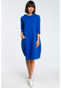 Sukienki.shop - Sukienka dresowa bombka oversize z kieszonką z przodu niebieska. Okazja: na co dzień. Kolor: niebieski, szary. Materiał: dresówka. Typ sukienki: bombki, oversize. Styl: casual #4