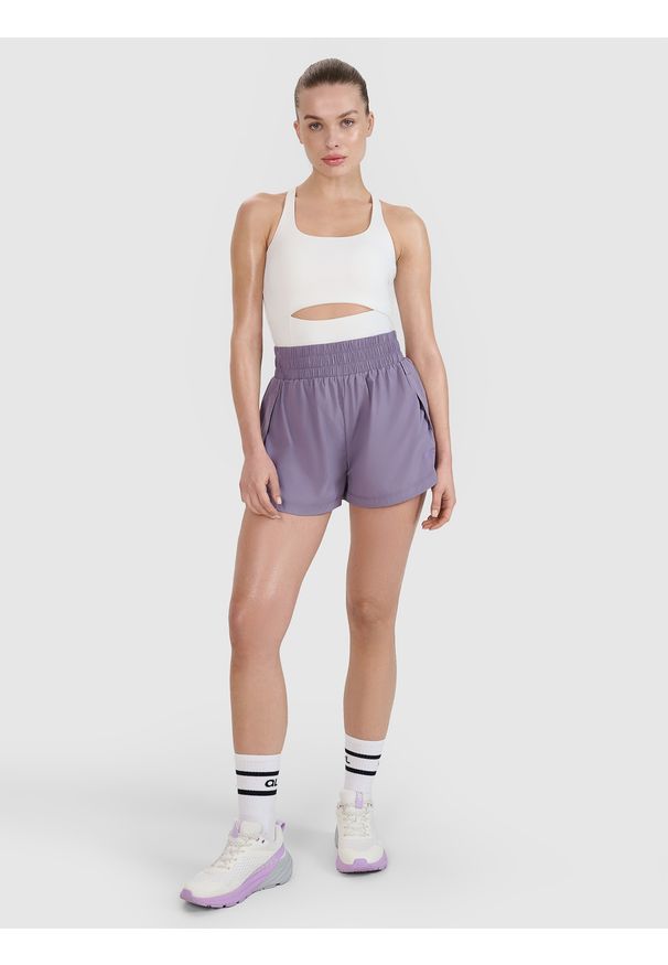 4f - 4F Spodenki treningowe szybkoschnące damskie 4F x Anna Lewandowska - fioletowe XL. Stan: podwyższony. Kolor: fioletowy. Materiał: materiał, tkanina, elastan, syntetyk, włókno. Długość: krótkie. Wzór: gładki. Sport: fitness