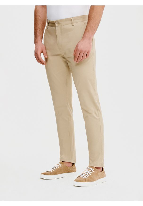 Pako Lorente - PAKO LORENTE – Beżowe gładkie spodnie męskie. Kolor: beżowy. Materiał: bawełna, elastan. Wzór: gładki. Styl: klasyczny