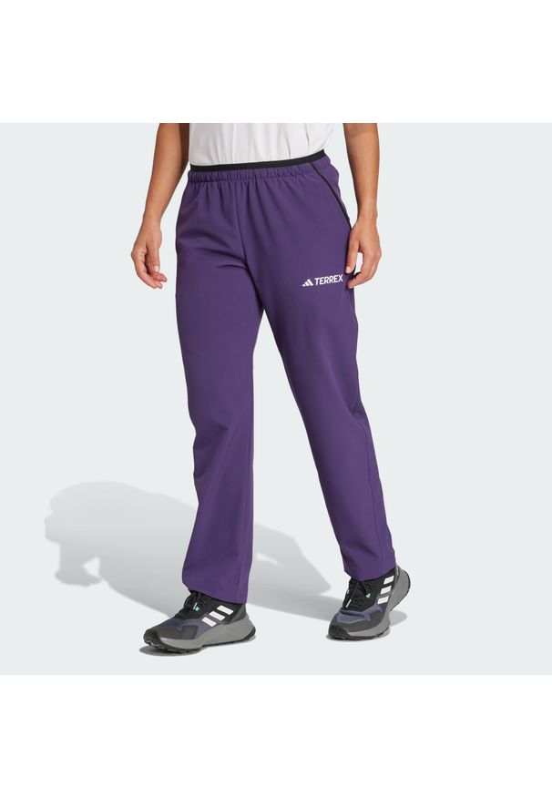 Adidas - Spodnie Terrex Multi Liteflex. Kolor: fioletowy. Materiał: materiał