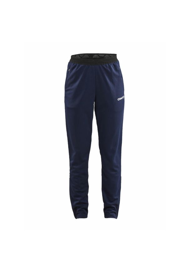 Spodnie sportowe damskie Craft Evolve. Kolor: niebieski. Materiał: syntetyk, materiał. Sport: fitness