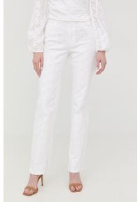 Guess jeansy damskie high waist. Stan: podwyższony. Kolor: biały. Wzór: haft