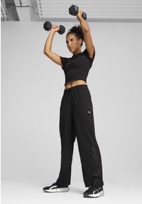 Puma - Damskie spodnie LACE PUMA Black. Stan: podwyższony. Kolor: czarny