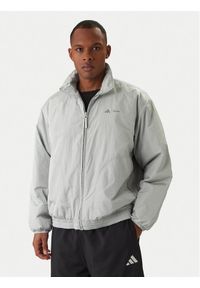 Adidas - adidas Kurtka przejściowa Moon Boot JM8923 Szary Loose Fit. Kolor: szary. Materiał: syntetyk #1