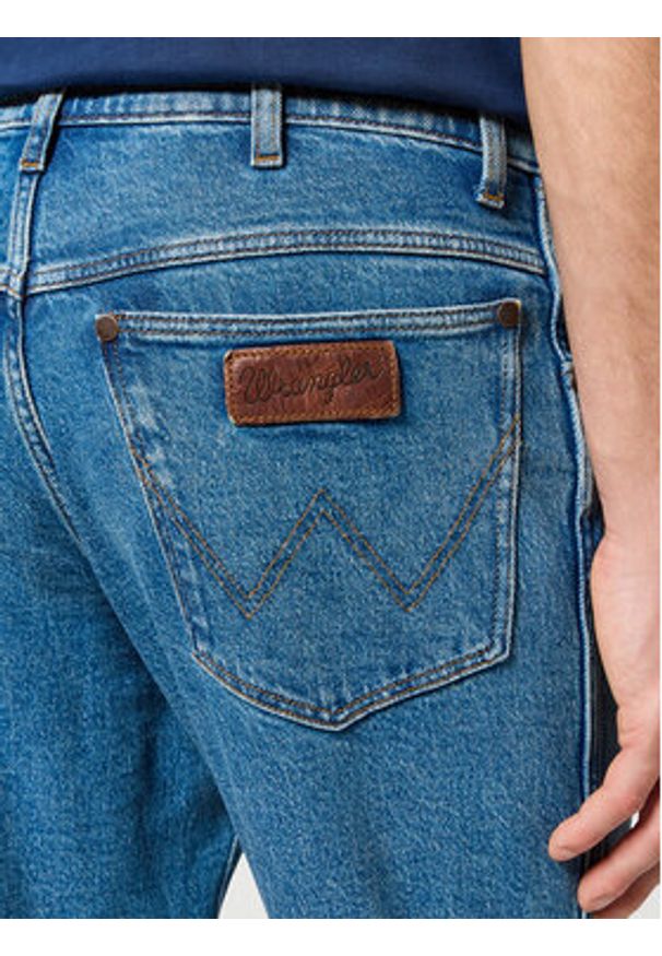 Wrangler Jeansy River 112356836 Niebieski Tapered Fit. Kolor: niebieski