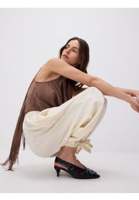 Reserved - Spodnie z wiązaniami na nogawkach - złamana biel. Materiał: tkanina, wiskoza #1