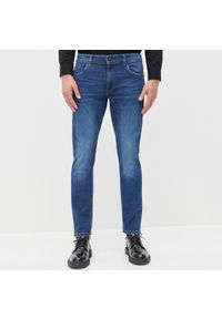 Reserved - Jeansowe spodnie slim fit - Granatowy. Kolor: niebieski. Materiał: jeans #1