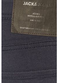 Jack & Jones - Spodnie. Kolor: niebieski. Materiał: tkanina. Wzór: gładki