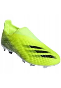 Adidas - Buty piłkarskie adidas X Ghosted.3 Ll Fg Jr FW6978 żółte wielokolorowe. Okazja: na co dzień. Kolor: wielokolorowy. Materiał: włókno, dzianina. Szerokość cholewki: normalna. Sport: piłka nożna