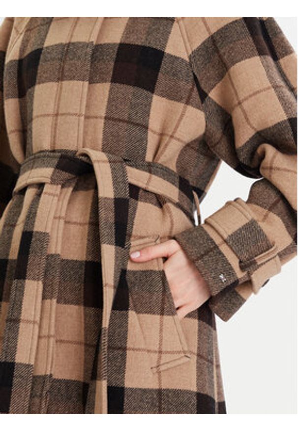 TOMMY HILFIGER - Tommy Hilfiger Płaszcz wełniany WW0WW46870 Beżowy Relaxed Fit. Kolor: beżowy. Materiał: wełna