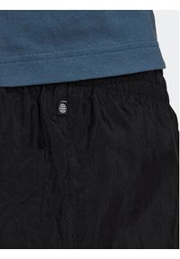 Adidas - adidas Spodnie dresowe Rekive HK7325 Czarny Regular Fit. Kolor: czarny. Materiał: syntetyk, dresówka #7