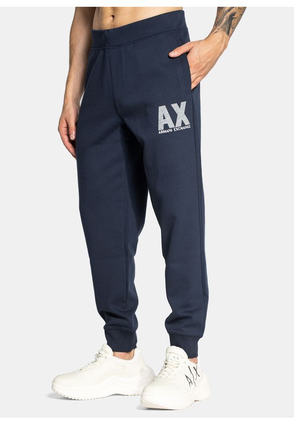 Spodnie dresowe męskie Armani Exchange (6KZPFG ZJ5UZ 1510). Kolor: niebieski. Materiał: dresówka. Sport: turystyka piesza