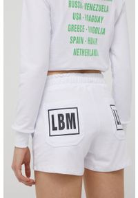 LABELLAMAFIA - LaBellaMafia szorty Flag damskie kolor biały z nadrukiem high waist. Stan: podwyższony. Kolor: biały. Wzór: nadruk