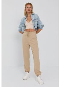 Vero Moda Spodnie damskie kolor beżowy gładkie. Kolor: beżowy. Materiał: bawełna, materiał, dzianina. Wzór: gładki #3
