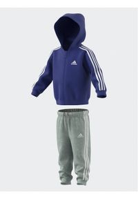 Adidas - adidas Komplet dresowy Essentials Full-Zip Hooded Jogger Set IB4763 Niebieski Regular Fit. Kolor: niebieski. Materiał: bawełna