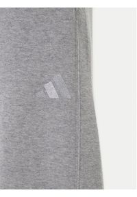 Adidas - adidas Spodnie dresowe ALL SZN Holiday Glitter Fleece JV5758 Szary Loose Fit. Kolor: szary. Materiał: bawełna #4