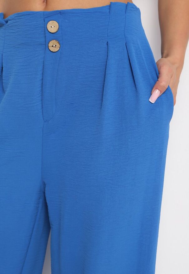 Born2be - Niebieskie Szerokie Spodnie Alladynki z Wysokim Stanem i Gumką w Talii Rissanas. Stan: podwyższony. Kolor: niebieski. Materiał: jedwab. Wzór: aplikacja
