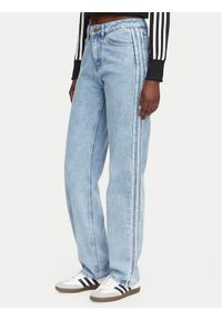 Adidas - adidas Jeansy Firebird KQ6490 Niebieski jasny Regular Fit. Kolor: niebieski #1