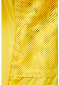 Adidas by Stella McCartney - adidas by Stella McCartney Kurtka damska kolor żółty przejściowa oversize. Typ kołnierza: kaptur. Kolor: żółty. Materiał: materiał. Długość rękawa: raglanowy rękaw