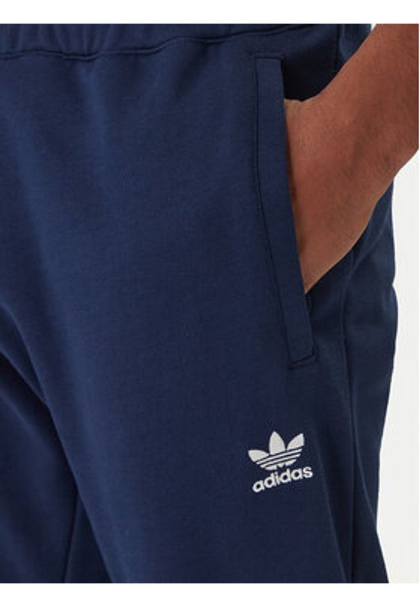 Adidas - adidas Spodnie dresowe Trefoil Essentials JD2423 Granatowy Slim Fit. Kolor: niebieski. Materiał: bawełna