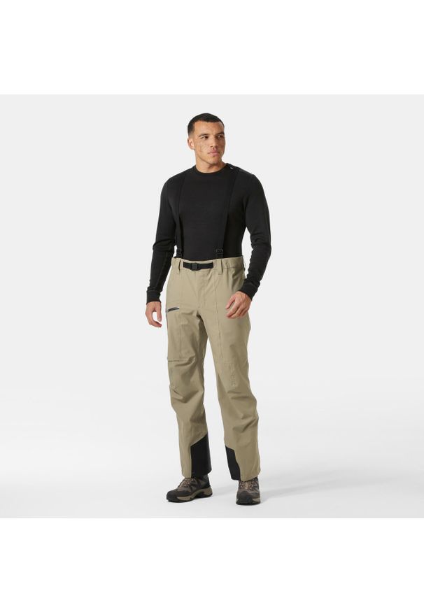 Kombinezon narciarski Helly Hansen Verglas BC. Kolor: brązowy. Sezon: zima. Sport: narciarstwo