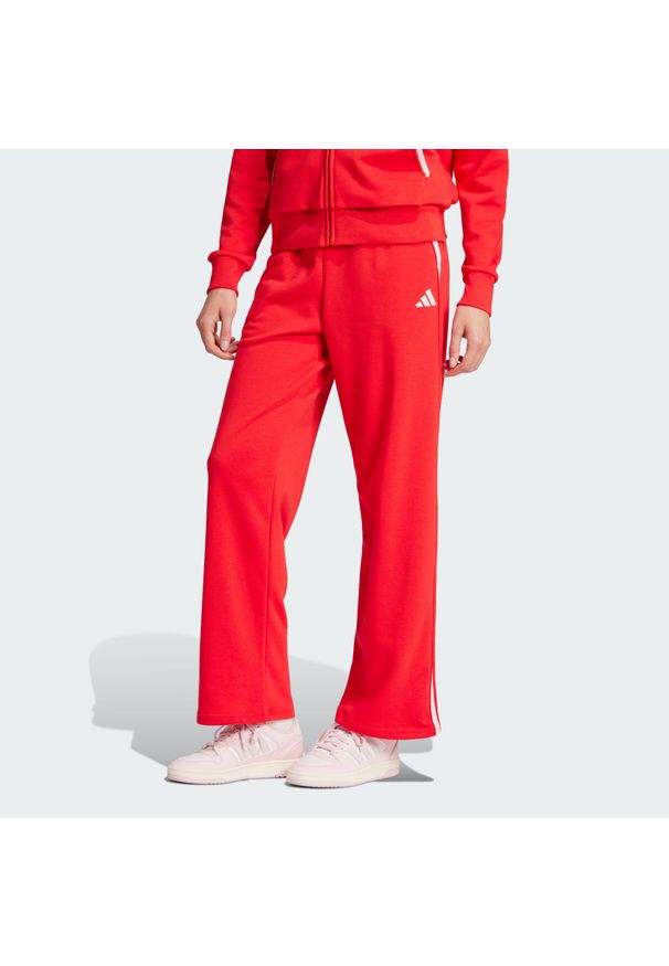 Adidas - Spodnie Essentials Color Pop French Terry. Kolor: czerwony. Materiał: materiał. Sport: fitness