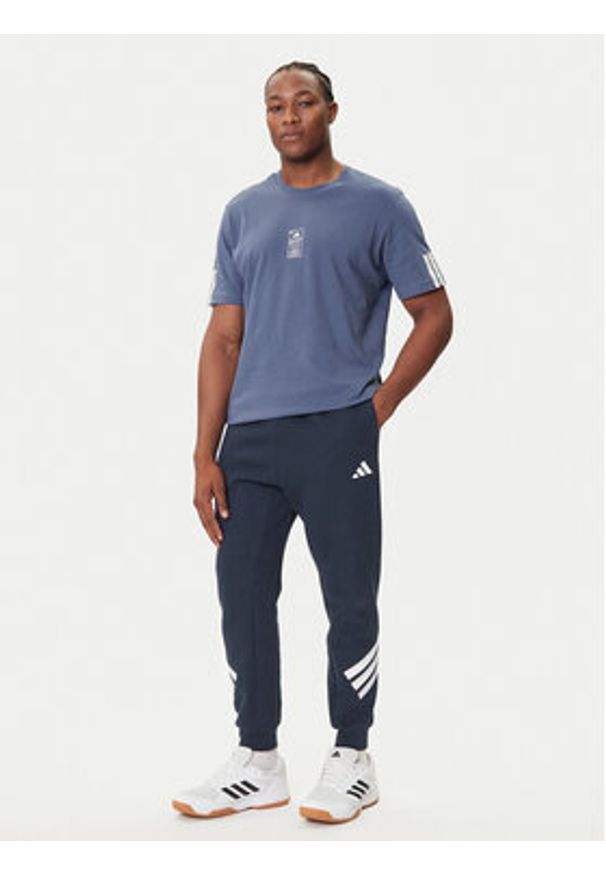 Adidas - adidas Spodnie dresowe Future Icons 3-Stripes JW7088 Granatowy Regular Fit. Kolor: niebieski. Materiał: syntetyk, bawełna
